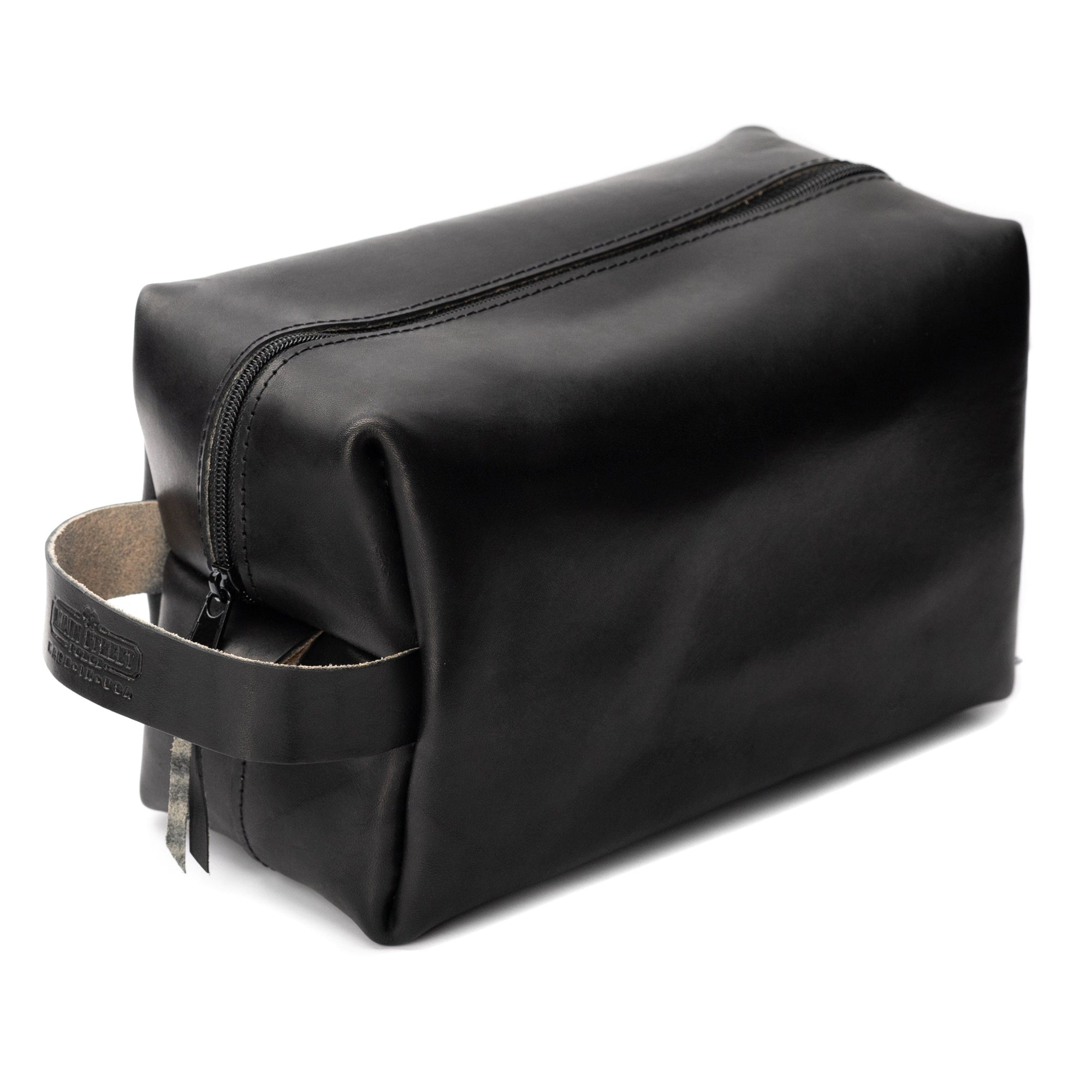 https://mainstreetforge.com/cdn/shop/products/premium-full-grain-leather-toiletry-bag-for-men-made-in-usa-travel-pack-for-shaving-essentials-accessories-compact-lightweight-mens-bathroom-shower-case-main-street-forge-midnight-bla_2000x.jpg?v=1649259768